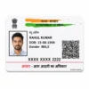Masked Aadhaar PVC card front view with fictional Indian details and visible date of birth